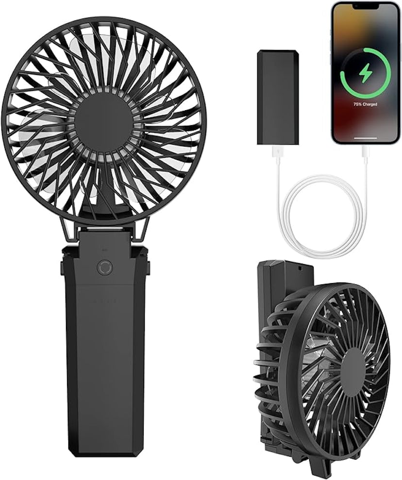 Portable rechargeable black handheld fan with a USB charging cable and a battery indicator on a smar...