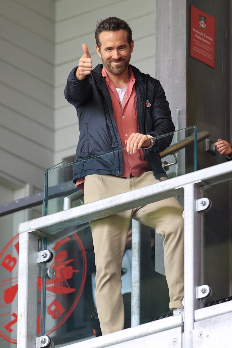 Ryan Reynolds giving a thumbs up to United's Wrexham AFC amenity kits.