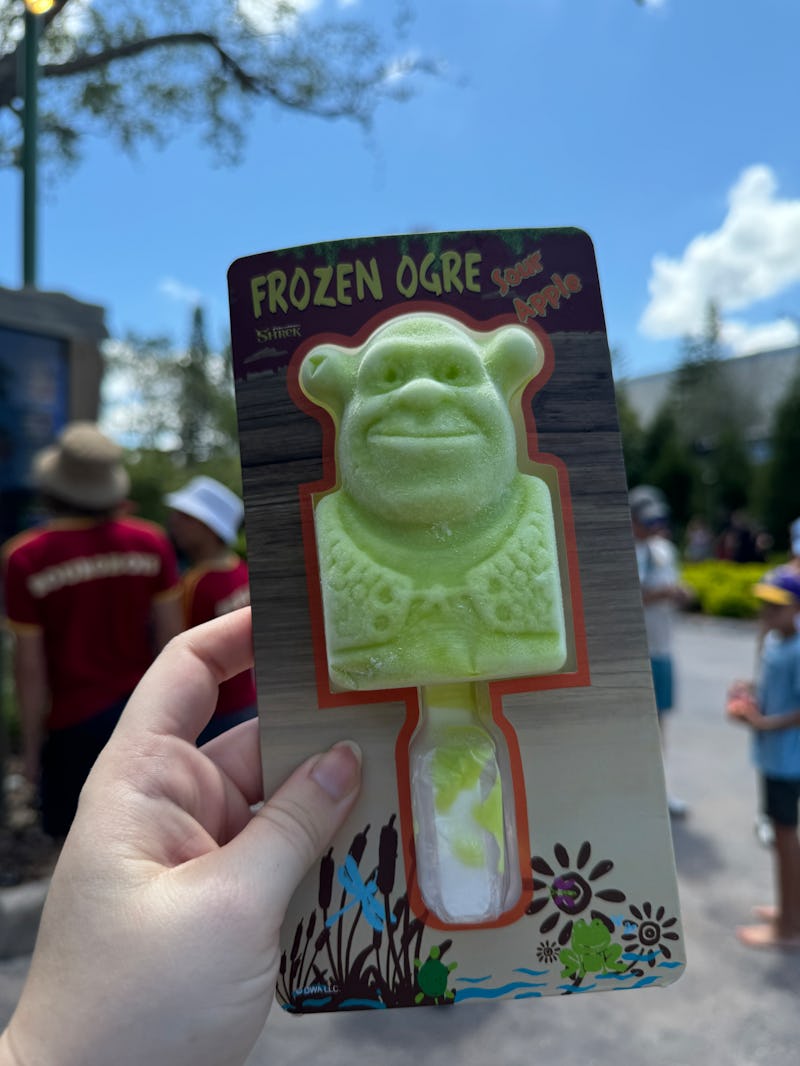 I tried the sour apple Shrek popsicle from Universal Studios. 