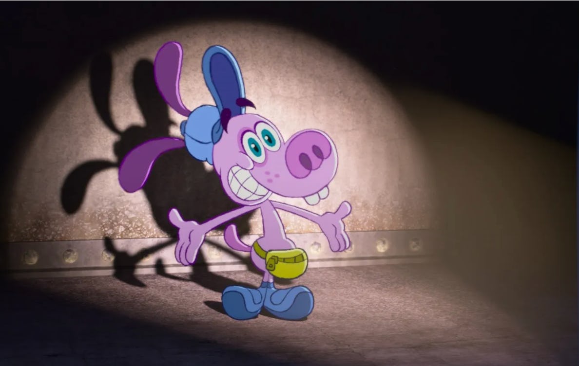 Bloofy stands happily in the spotlight.