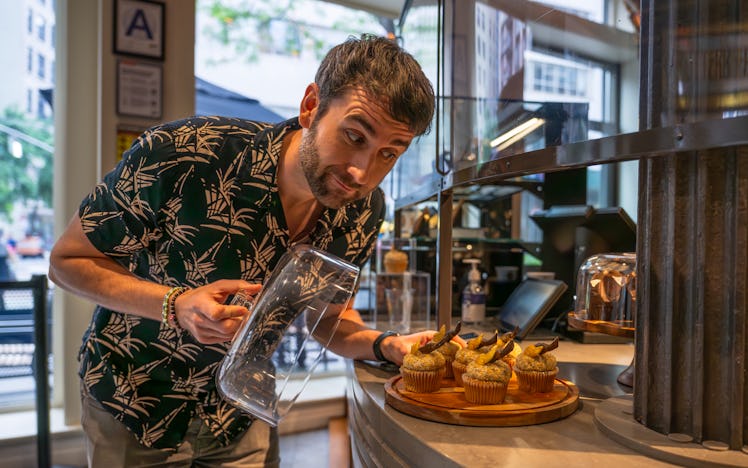 Matthew Lewis (aka Neville Longbottom) at Harry Potter's New York City flagship store with broomstic...