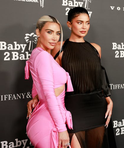 Kim Kardashian (L) and Kylie Jenner arrive for the 2022 Baby2Baby Gala honoring Kim Kardashian, at P...
