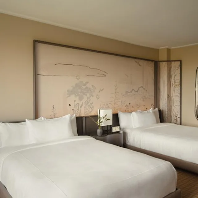 Unwind in rooms and suites featuring hand-painted murals, unobstructed park views, and cozy comforts