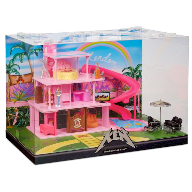 A vibrant toy set, labeled "Kendom" with a Ken logo, featuring a pink two-story house with a spiral ...