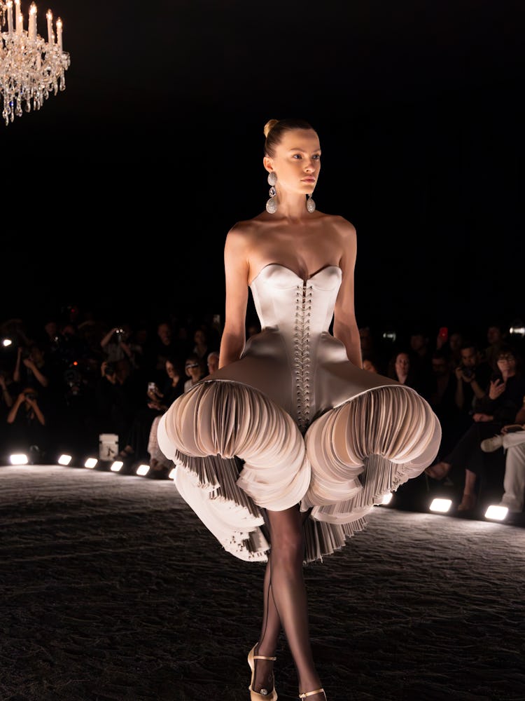 a look from schiaparelli couture fall 2024 runway show in paris