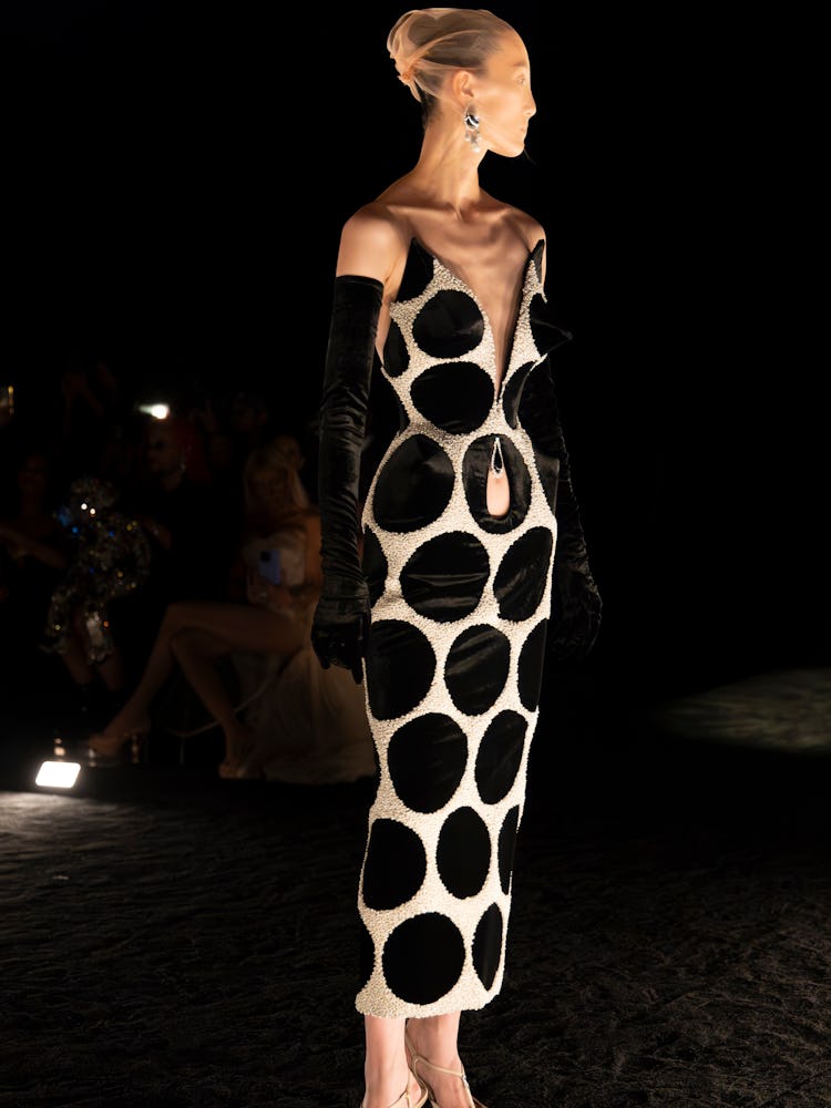 a look from schiaparelli couture fall 2024 runway show in paris