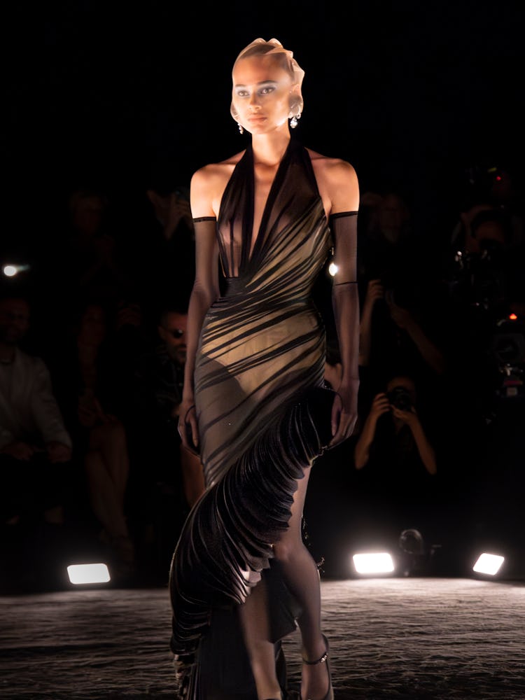 a look from schiaparelli couture fall 2024 runway show in paris