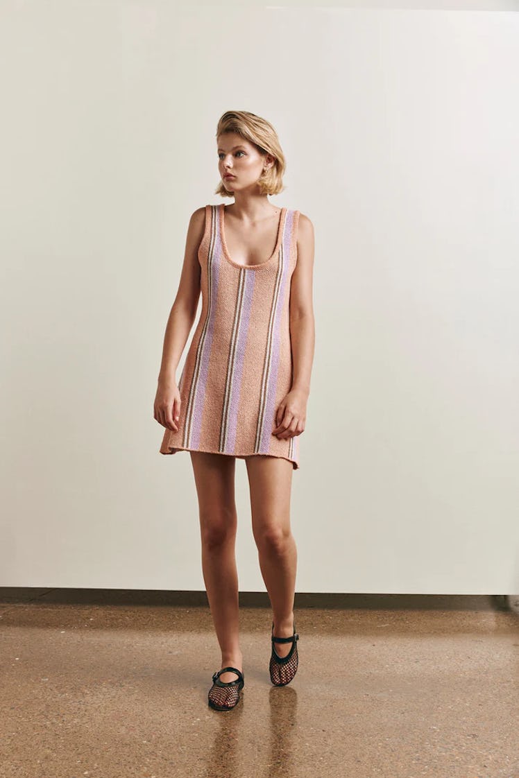 This knit dress is from the same designers of Taylor Swift's crochet dress. 