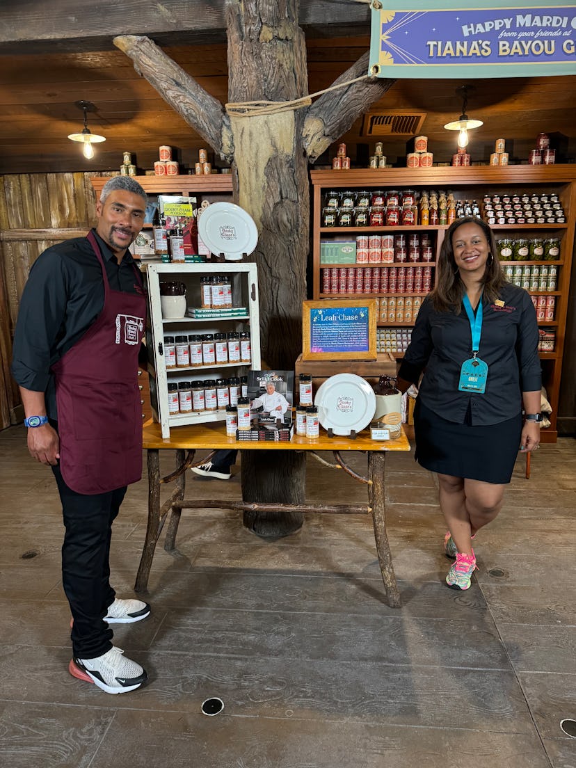 Edgar "Dook" Chase IV and Myla Poree, grandchildren of Leah Chase, stand with Dooky Chase spices and...