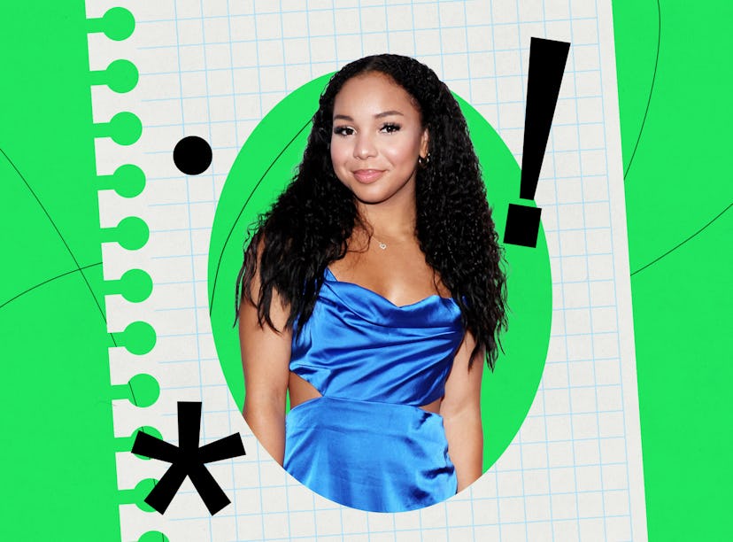 A stylish young woman dressed in a blue satin top against a graphic green background with notebook-s...