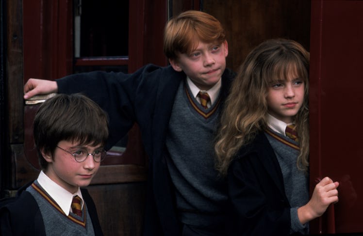 Daniel Radcliffe, Rupert Grint, and Emma Watson in Harry Potter and the Sorcerer's Stone
