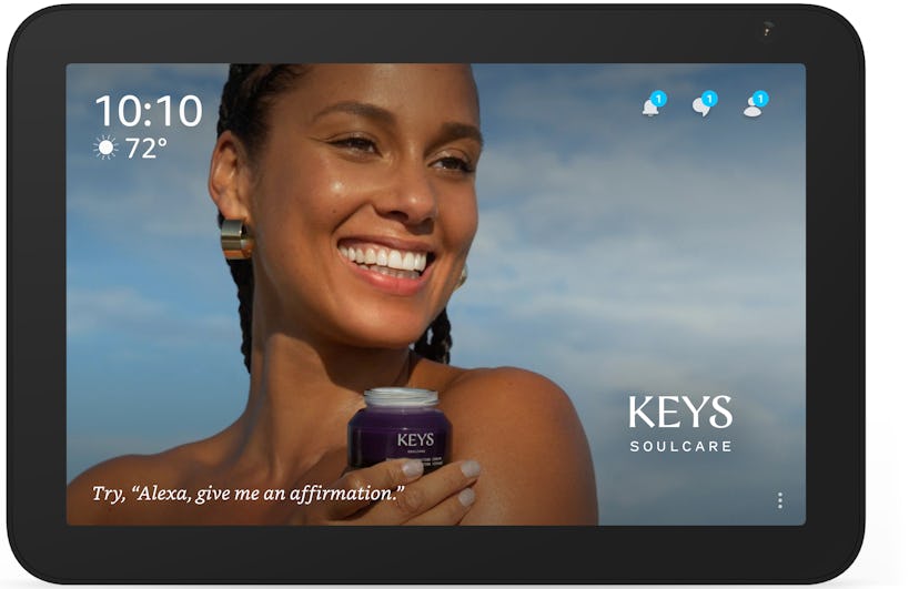 Alicia Keys holding a Keys Soulcare product