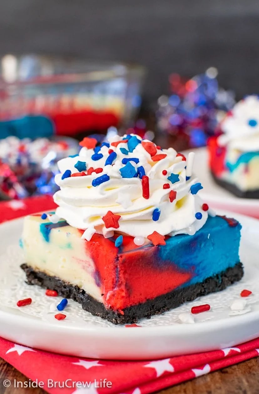 Red, white, and blue cheesecake bars is a make-ahead Fourth of July dessert idea to enjoy.