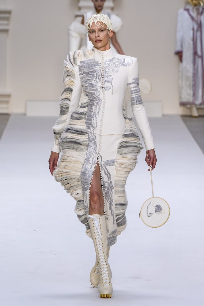  A model walks the runway during the Thom Browne Haute Couture Fall/Winter 2024-2025 fashion show as...