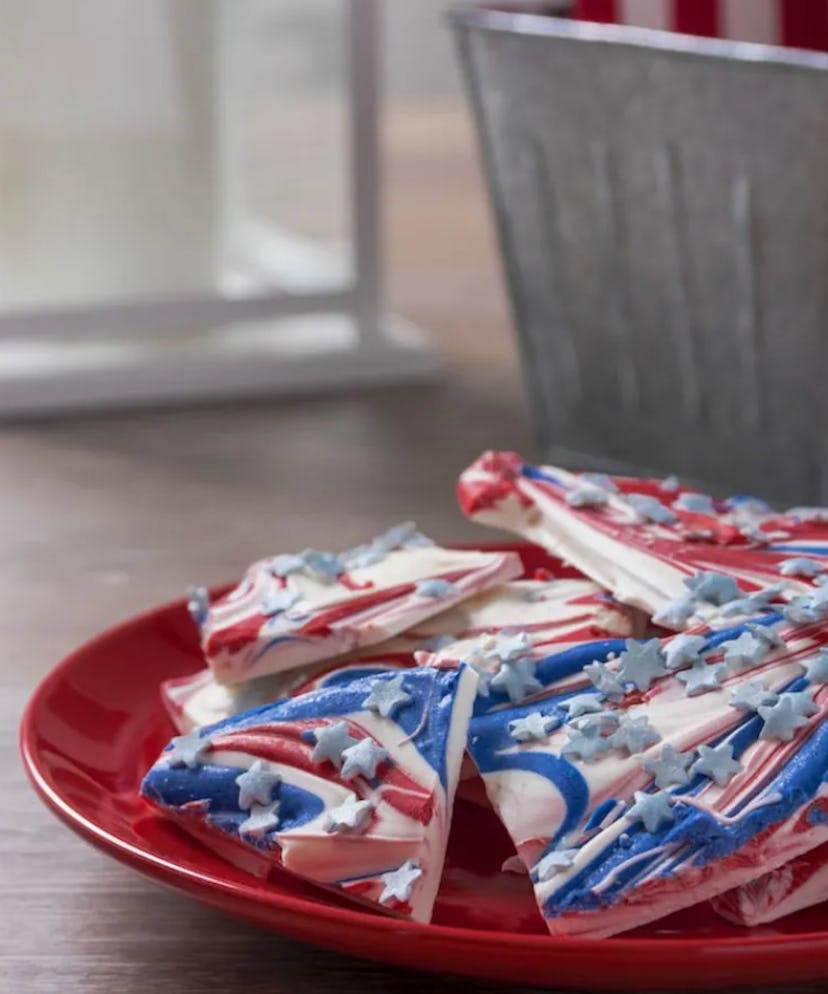 Red, white, and blue candy bark is one of the best make-ahead Fourth of July desserts.