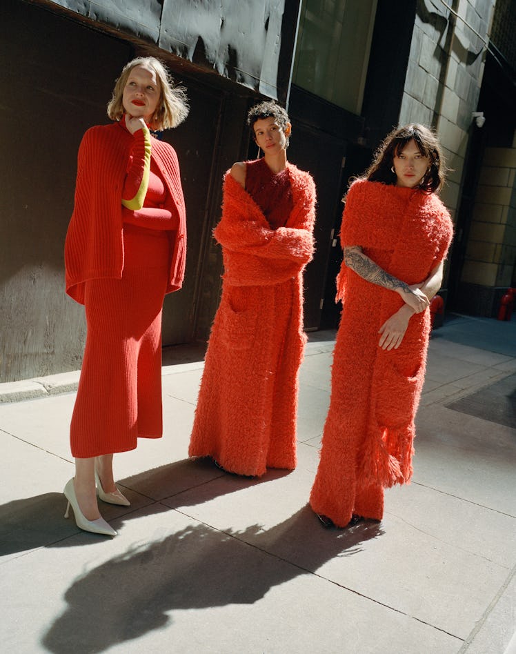 Models in red Zankov knits