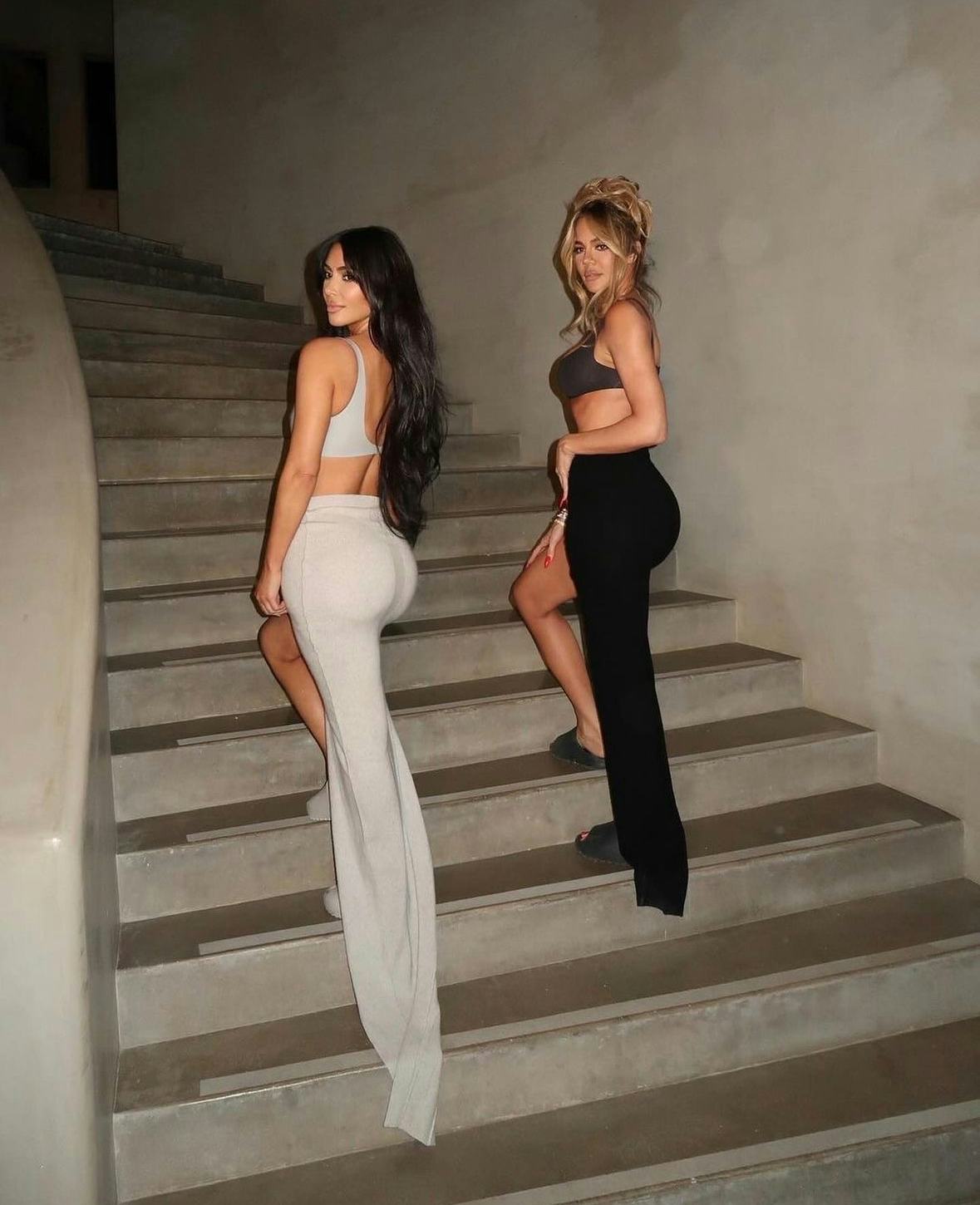 Kim Kardashian and Khloe Kardashian wore matching bra top outfits to celebrate the Good American fou&hellip;