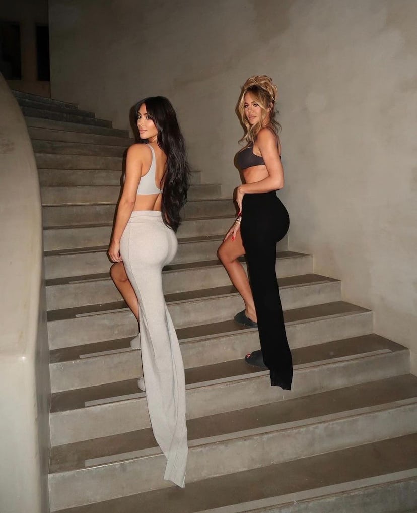 Kim Kardashian and Khloe Kardashian wore matching bra top outfits to celebrate the Good American fou…