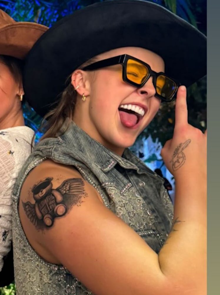 JoJo Siwa's teddy bear arm tattoo is apparently a teaser for her album art.