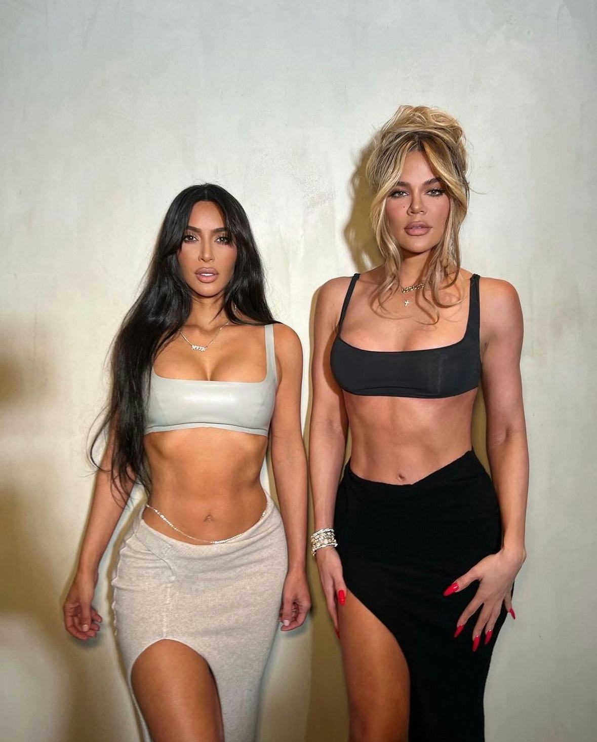 Kim Kardashian and Khloe Kardashian wore matching bra top outfits to celebrate the Good American fou&hellip;