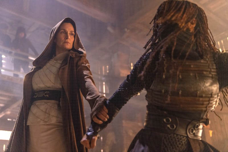 Jedi Master Indara (Carrie-Anne Moss) and Mae (Amandla Stenberg) battle in the opening episode of 'T...