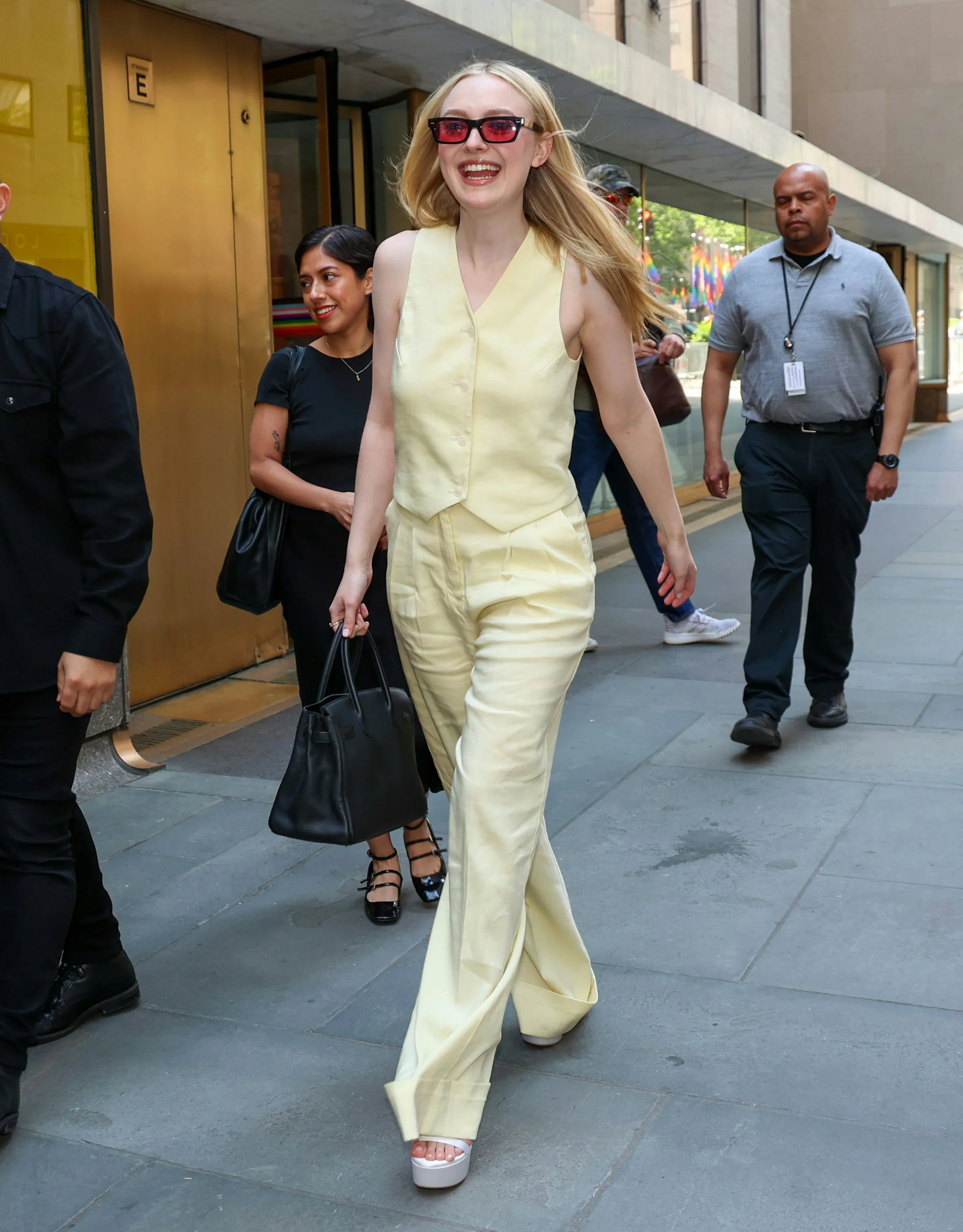 Dakota Fanning Is a Stealth Wealth CEO In a Buttery Suit Vest & Birkin Bag - Vimarsana News