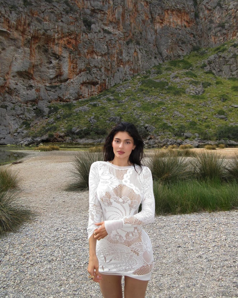 Kylie Jenner wears a little white Jean Paul Gaultier dress, while in Mallorca with sister Kendall Je...