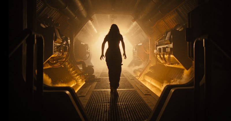 'Alien: Romulus' trailer, featuring a woman in a dimly lit corridor. 