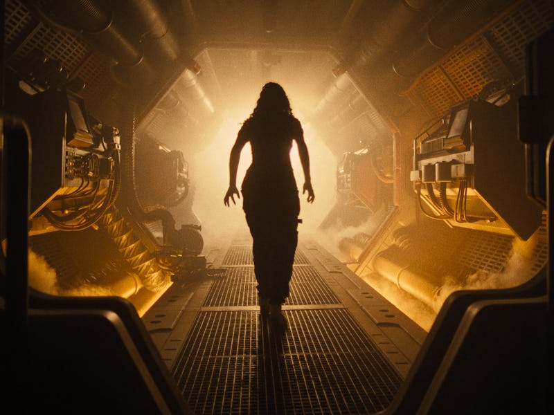 'Alien: Romulus' trailer, featuring a woman in a dimly lit corridor.