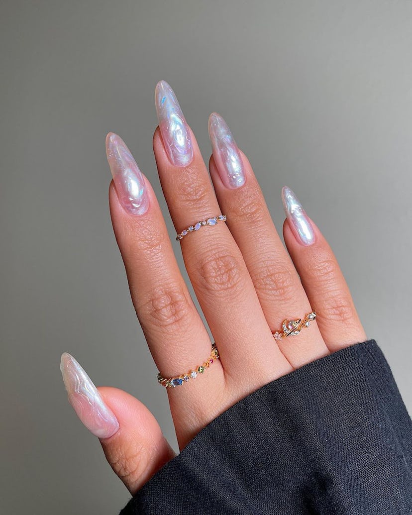 3D textured nails with a holographic finish are perfect for an Aquarius on their wedding day.
