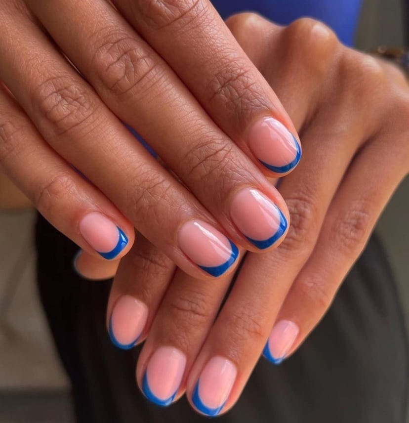 Cobalt blue details on their nails are perfect for a Sagittarius on their wedding day.