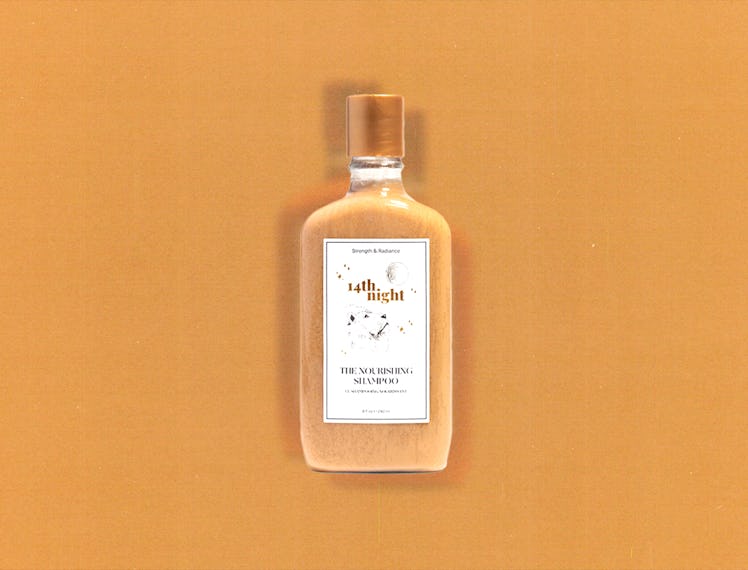 A bottle of 14th Night shampoo