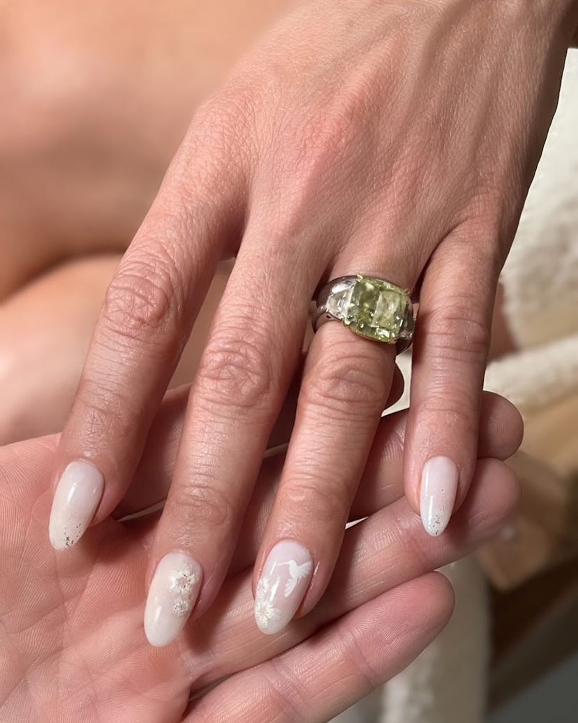 White nails with earthy artwork is perfect for a Virgo on their wedding day.