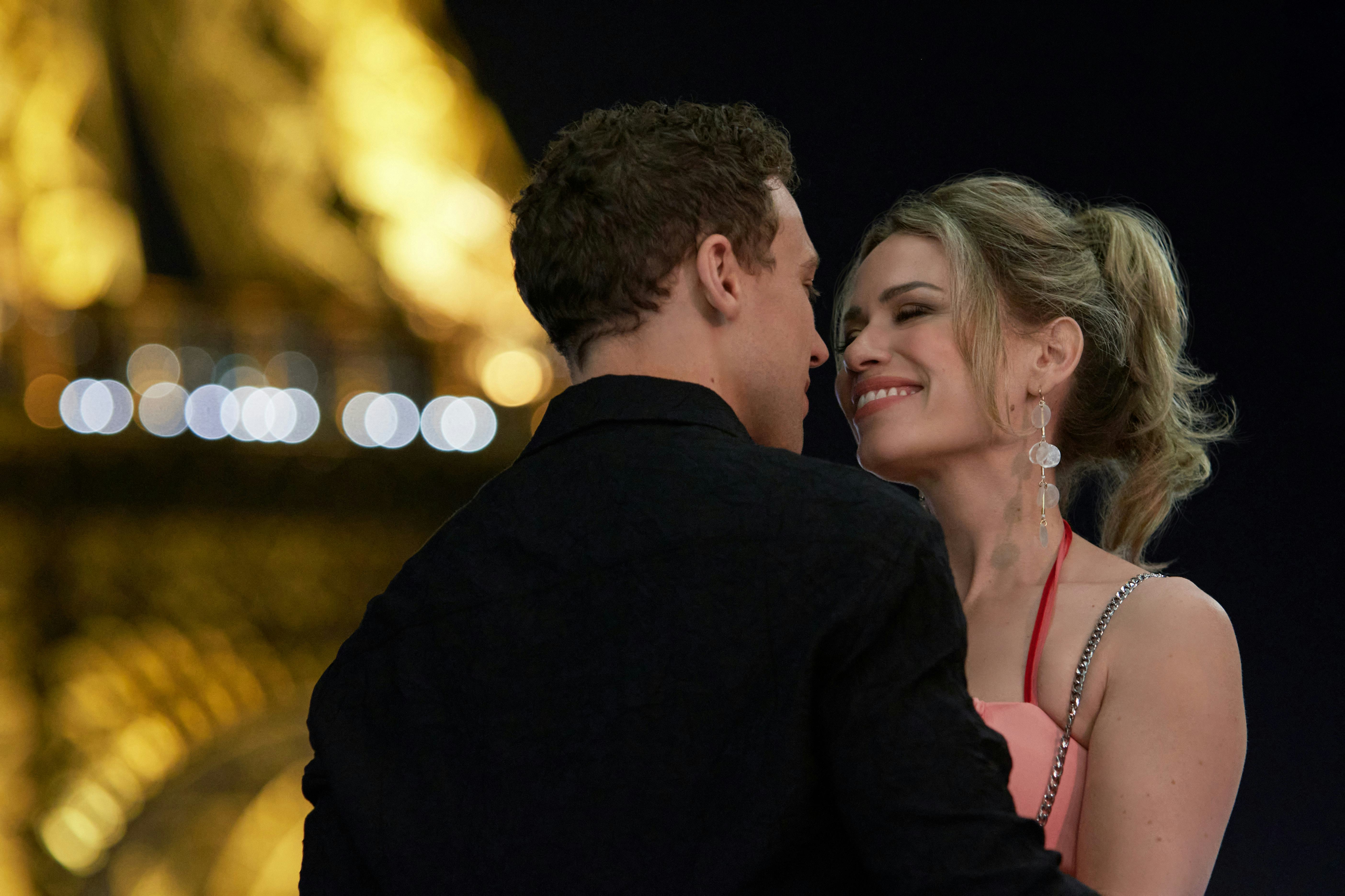 Ben Wiggins and Bethany Joy Lenz in &lsquo;Savoring Paris.&rsquo; Photo via Hallmark Media