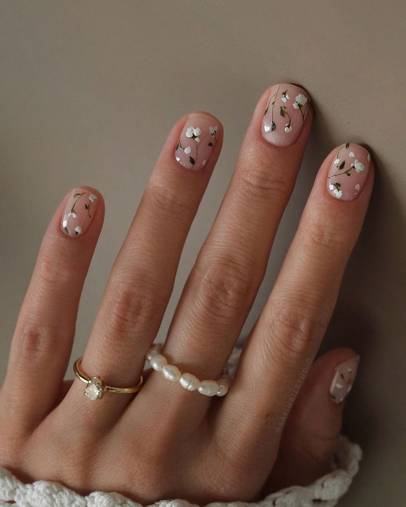 Soft floral nail art is perfect for a Taurus on their wedding day.