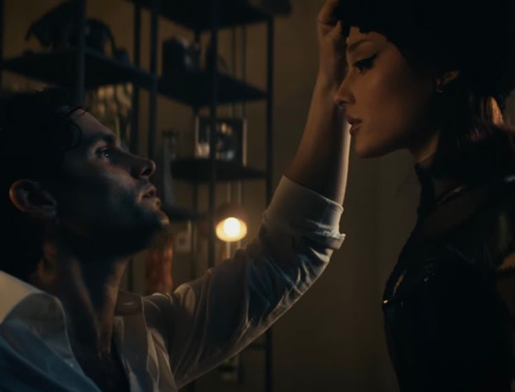 Penn Badgley and Ariana Grande in "the boy is mine" music video