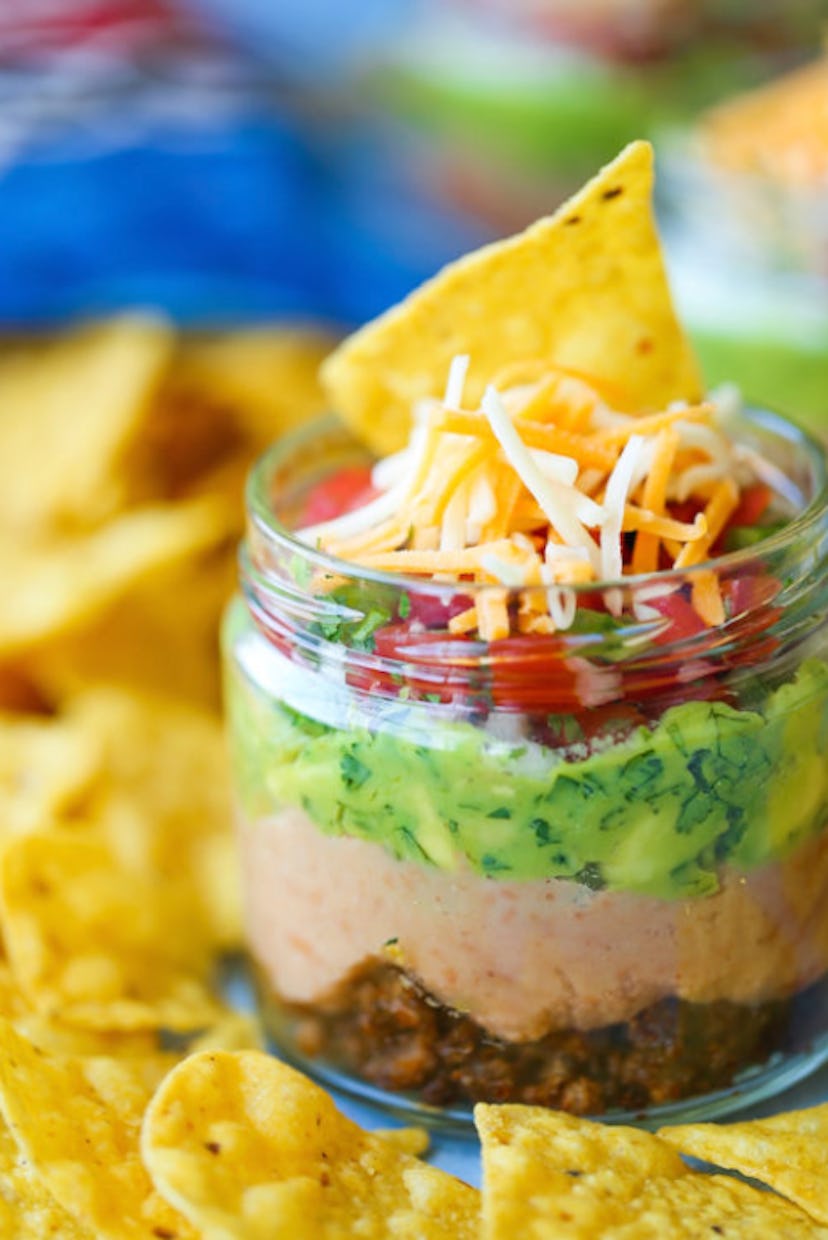 Mason jar taco dip is a make-ahead summer appetizer idea to try.