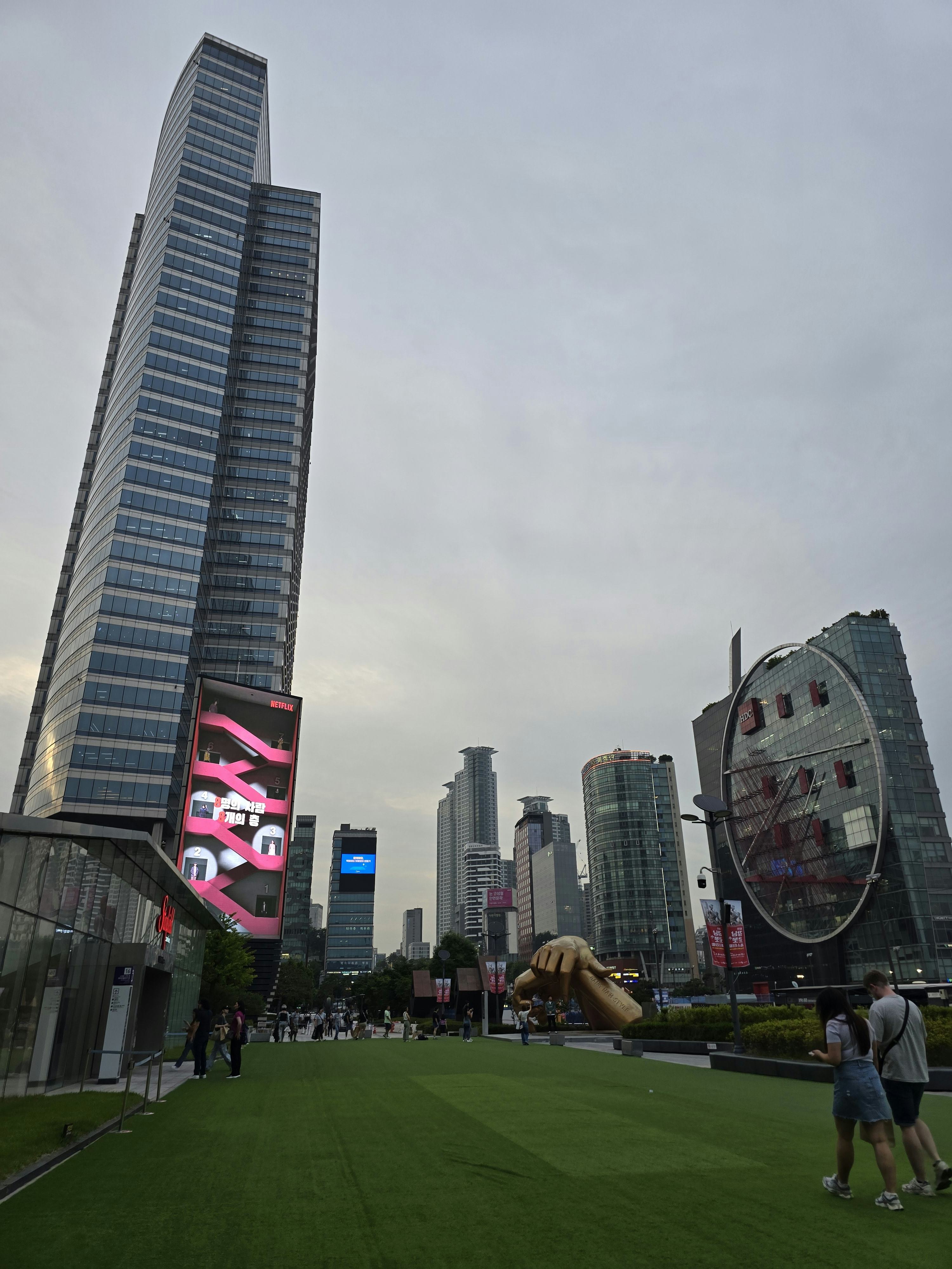 An outdoor plaza and the Statue of Gangnam Style surround the outside of Starfield Coex Mall in Seou&hellip;