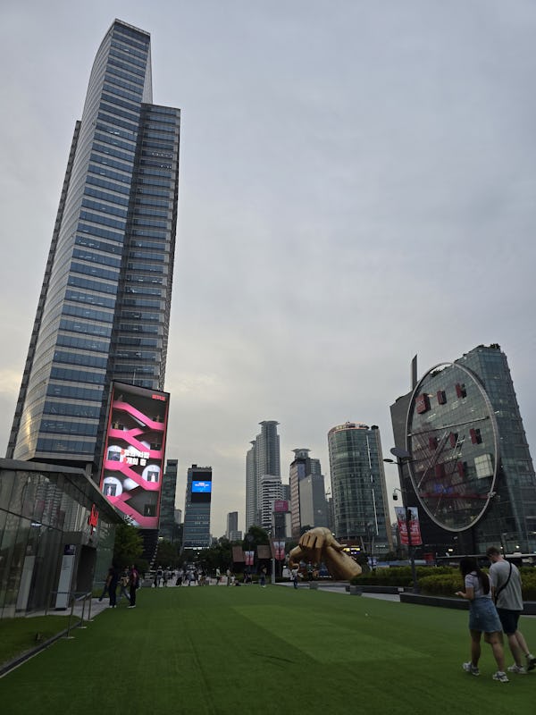 An outdoor plaza and the Statue of Gangnam Style surround the outside of Starfield Coex Mall in Seou…