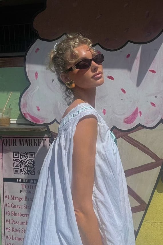 Pisces should rock the cottagecore aesthetic at the beach this summer.