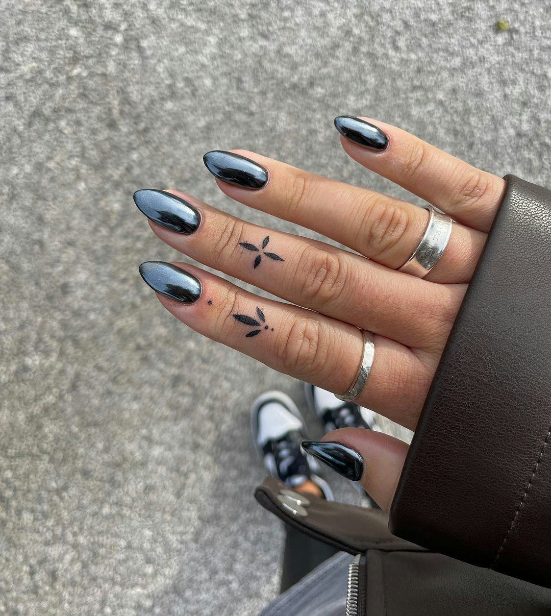 A Scorpio would wear gunmetal chrome nails.