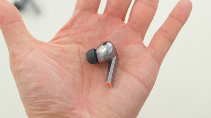 A Samsung Galaxy Bud 3 Pro in Inverse Deputy Tech Editor Ray Wong's hand.