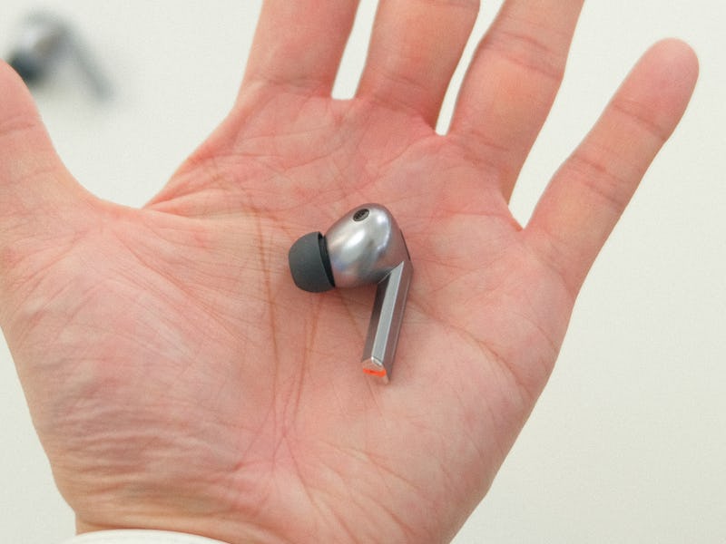 A Samsung Galaxy Bud 3 Pro in Inverse Deputy Tech Editor Ray Wong's hand.