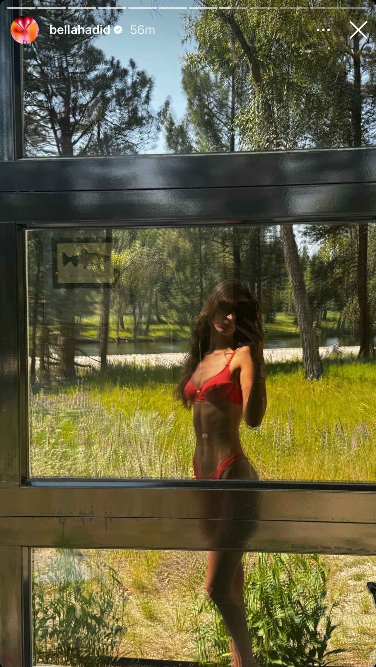 Bella Hadid wears a red bikini.