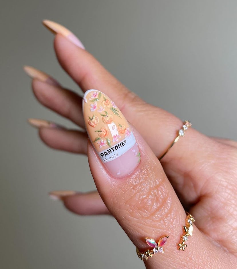 Try Pantone “peach fuzz” nail art for summer 2024.