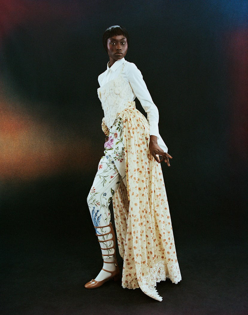 A model wears a Dior pant and skirt