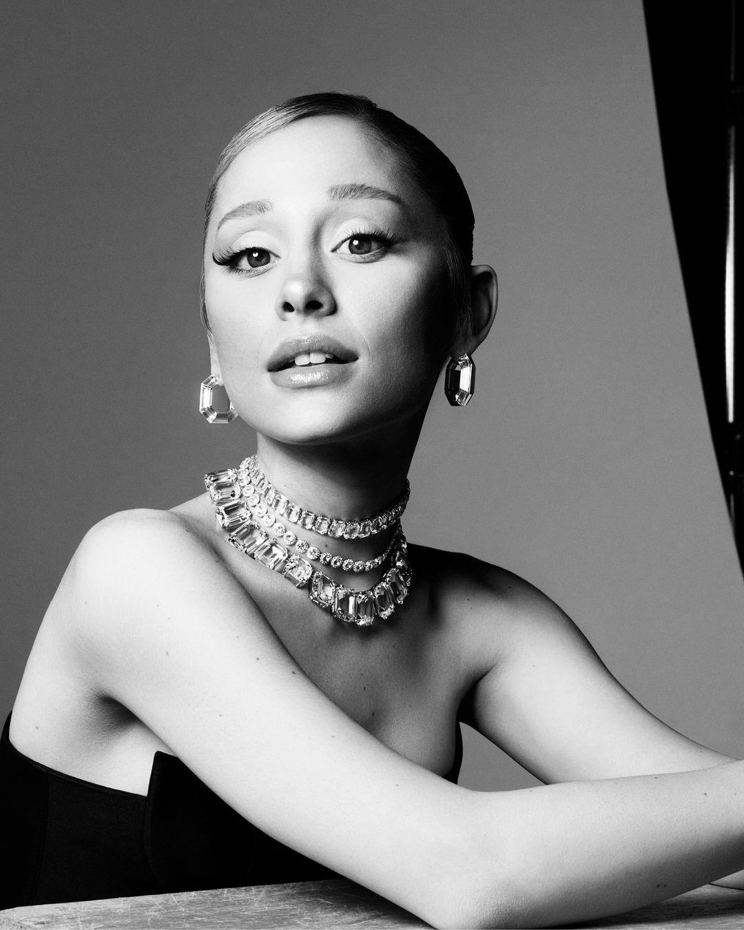 Ariana Grande sparkled in photos of her new Swarovski campaign.