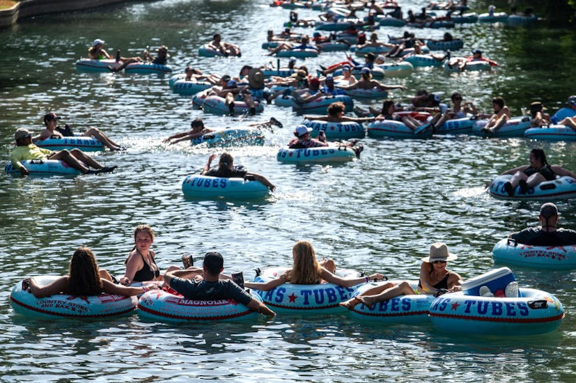 People float down the Comal River on Saturday, July 15, 2023 in New Brunfels, TX. Hundreds of people...