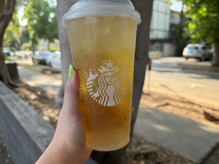 I tried Starbucks' Tropical Citrus Iced Energy drink off their summer 2024 menu, and compared it to ...