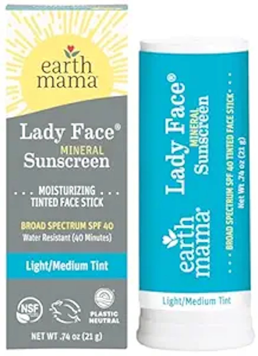 Earth Mama Lady Face mineral sunscreen in a light/medium tint stick, labeled SPF 40 and water-resist...